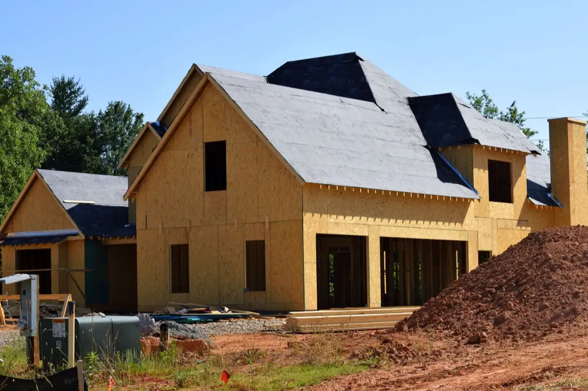 House with new roof decking and synthetic underlayment during a roof replacement in Edinburg, TX