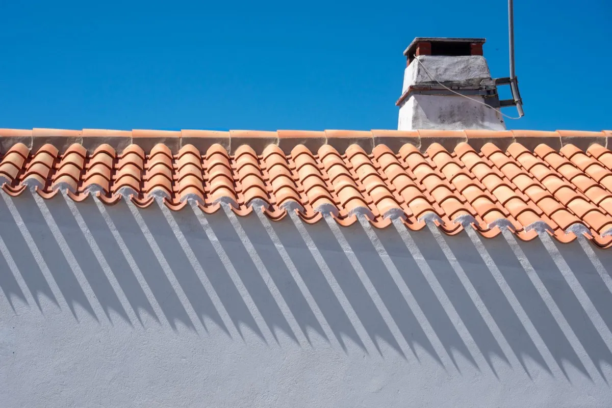 Roof ridge line and chimney on a home in Edinburg, TX